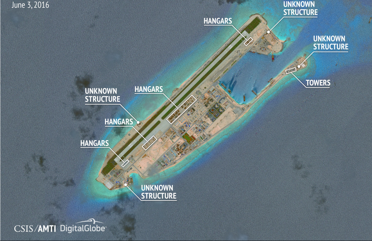 TQ xây trái phép hàng loạt nhà chứa chiến đấu cơ ở Trường Sa - Ảnh 3. TQ xây trái phép hàng loạt nhà chứa chiến đấu cơ ở Trường Sa - Ảnh 3.