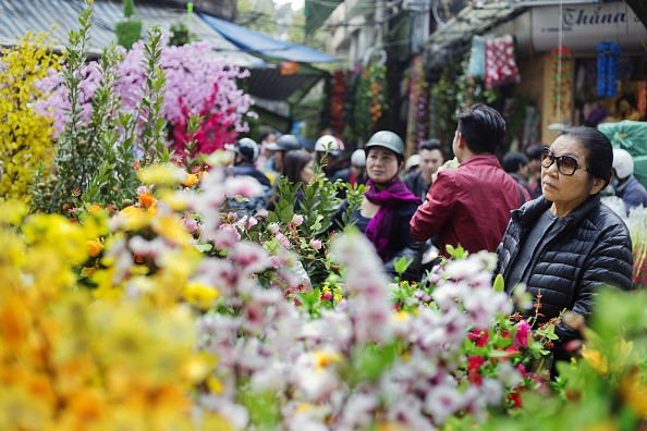 Không khí đón Tết nhộn nhịp khắp châu Á - Ảnh 5.