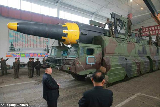 Triều Tiên công bố video tên lửa mới có thể chở đầu đạn hạt nhân - Ảnh 8.