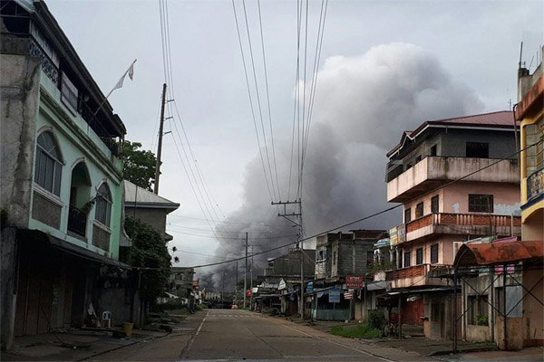 Những hình ảnh phơi bày chiến sự ác liệt ở Nam Philippines - Ảnh 8.