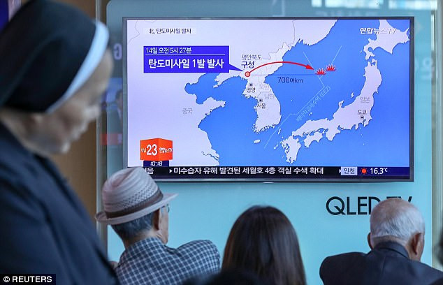 Triều Tiên công bố video tên lửa mới có thể chở đầu đạn hạt nhân - Ảnh 11.