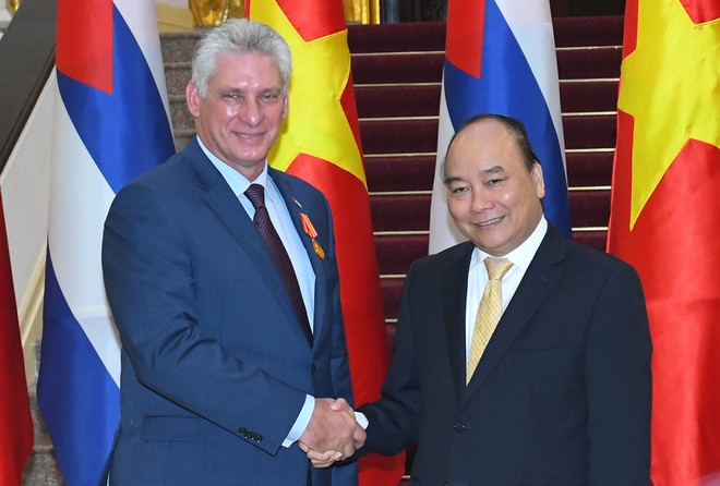 Tổng Bí thư, Chủ tịch nước Nguyễn Phú Trọng đón chính thức Chủ tịch Hội đồng Nhà nước Cuba thăm Việt Nam - Ảnh 10.