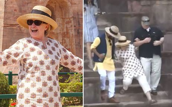 Ngã liên tục, bà Hillary Clinton bỏ dép, đi chân đất tại Ấn Độ Ngã liên tục, bà Hillary Clinton bỏ dép, đi chân đất tại Ấn Độ