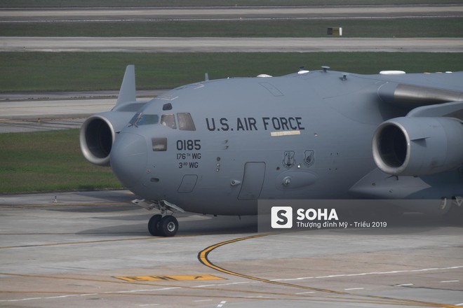 Vận tải cơ C-17 thứ ba đáp xuống Nội Bài, tiếp tục chuyển phương tiện phục vụ ông Trump - Ảnh 10.