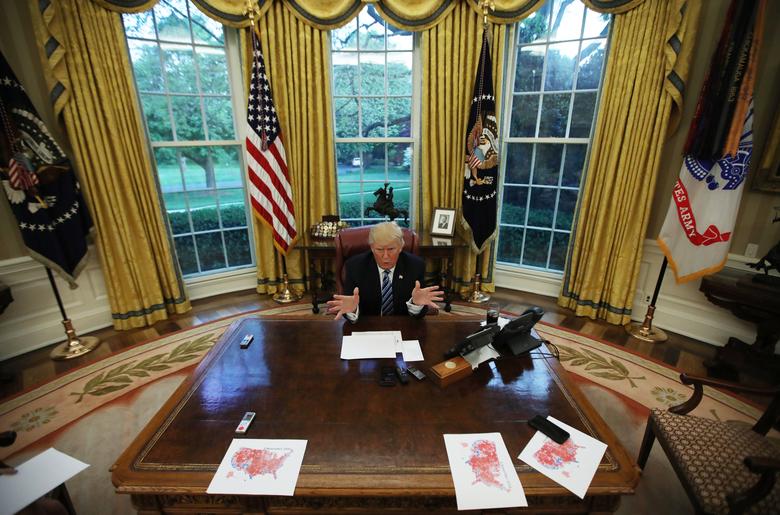 16 khoảnh khắc đáng nhớ trong nhiệm kỳ đầu tiên của Tổng thống Donald Trump qua ảnh Reuters - Ảnh 4.