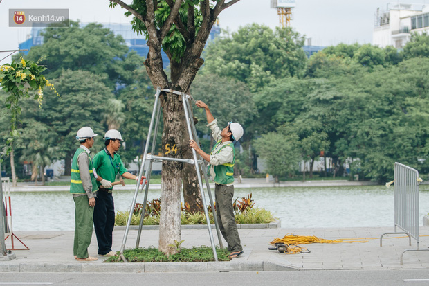 Chùm ảnh: Tiết trời se lạnh, người Hà Nội khoác thêm áo ấm, hưởng trọn không khí mát lành của mùa Thu - Ảnh 11.