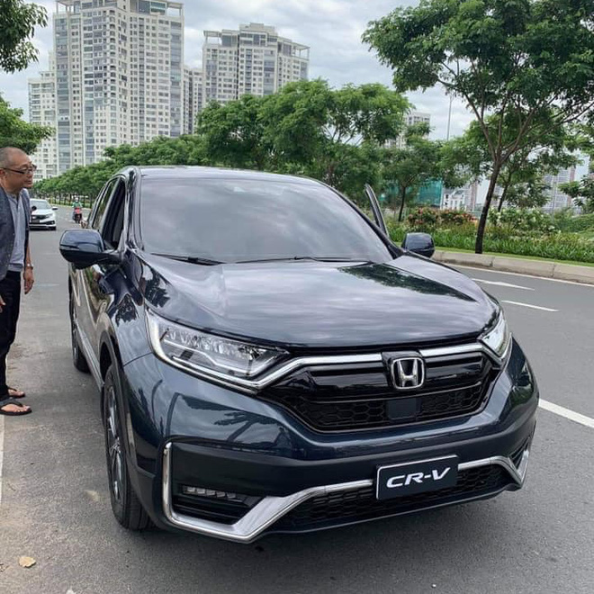 Honda CR-V bản lắp ráp 2020 đầu tiên lăn bánh ra đường tại Việt Nam, tiết lộ tính năng an toàn mới - Ảnh 1.