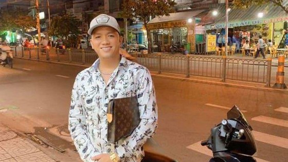 Bị can gây ra vụ băng áo cam đập phá quán nhậu ở quận Bình Tân ra đầu thú - Ảnh 1.