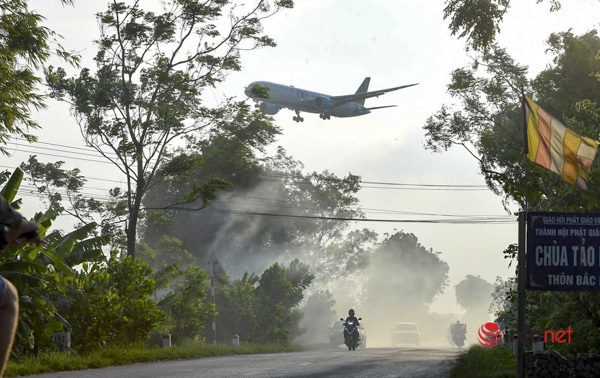 Mùa hun khói ở Hà Nội, máy bay cũng ngán sợ - Ảnh 9.