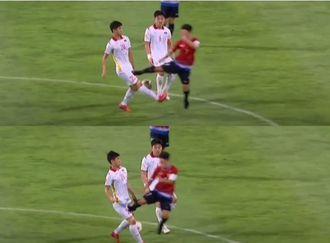 “Messi Lào” đáng phải nhận thẻ đỏ vì đạp thẳng vào chân Phan Văn Đức? - Ảnh 1. “Messi Lào” đáng phải nhận thẻ đỏ vì đạp thẳng vào chân Phan Văn Đức? - Ảnh 1.