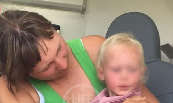 Bé gái hơn 1 tuổi ở Nga được tìm thấy sau khi đi lạc 3 ngày đêm trong rừng rậm - Ảnh 3.