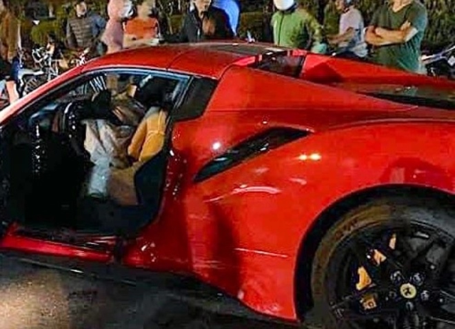 Cô gái ngồi ghế lái vụ xe Ferrari gây tai nạn chết người, CSGT Hà Nội lên tiếng - Ảnh 2.