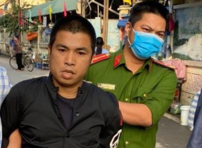 Kẻ đâm gục người phụ nữ bán hàng nước ở Hà Nội có bệnh án tâm thần - Ảnh 1.