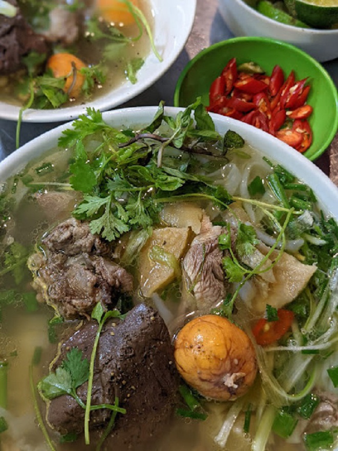 3 quán phở gà ở Hà Nội được trang mạng quốc tế gợi ý cho du khách - Ảnh 8.