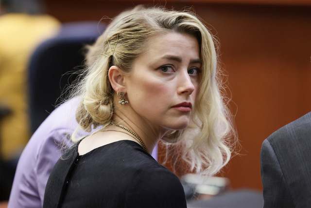 Amber Heard chính thức nộp đơn kháng cáo trong vụ kiện với Johnny Depp - Ảnh 1.