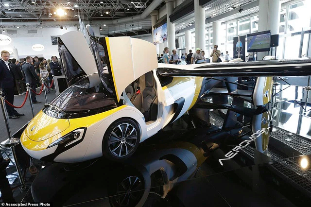The world's first 4-seater taxi that can both run and fly will come into operation in 2027 - Photo 5.
