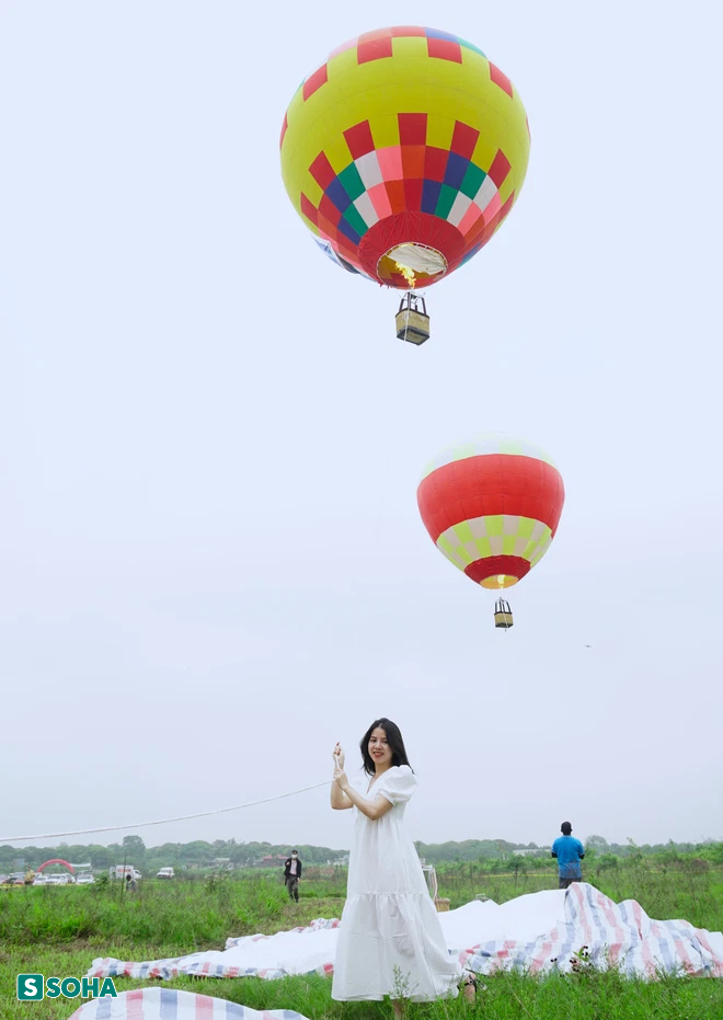 Khinh khí cầu khổng lồ lần đầu xuất hiện, người dân ngắm nhìn Hà Nội từ trên cao - Ảnh 5.