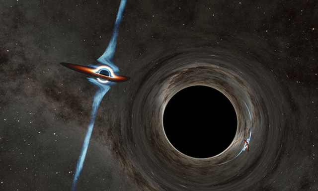 Phát hiện hai 2 siêu lỗ đen đang lao vào nhau, sẽ làm cong vênh cả không gian và thời gian - Ảnh 1.