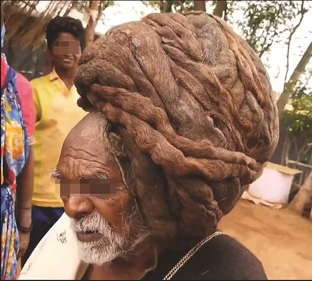 The man with the biggest hair in the world - Photo 1.