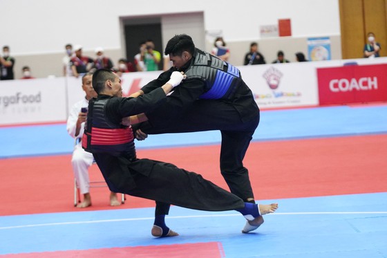 Những pha võ ấn tượng của 2 chủ nhân huy chương vàng Pencak Silat - Ảnh 17.