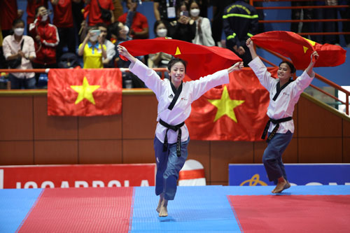 New bachelor and 5th SEA Games martial arts gold medal - Photo 1.