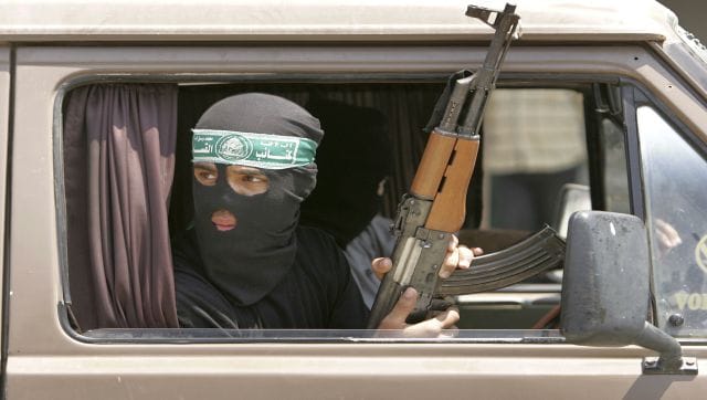 Chính trị gia, Vị khách và Người mạnh mẽ: Bộ ba quyền lực đằng sau Hamas - Ảnh 1.