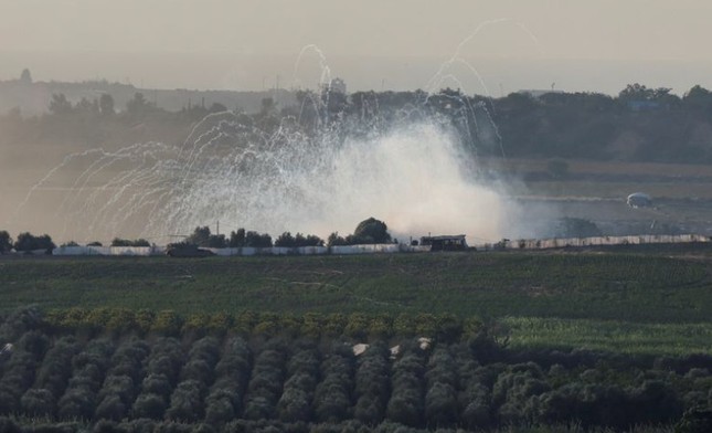 Hamas dùng tên lửa tự sản xuất đáp trả bộ binh Israel - Ảnh 1.