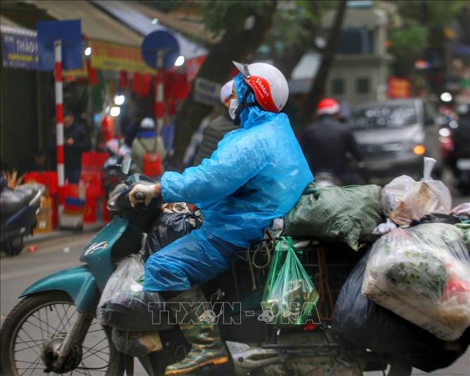 Người phải làm việc trong thời tiết giá rét làm như thế nào để tự bảo vệ bản thân?- Ảnh 1.