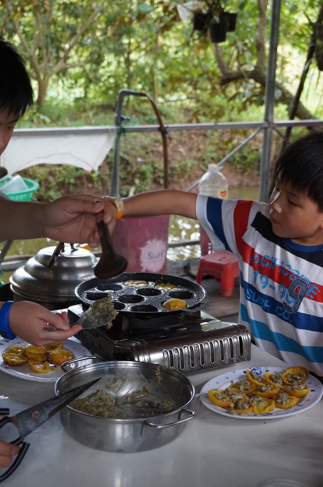 Ngoài "đặc sản" cá lóc bay, Tết này tìm tới Cần Thơ hái quả vú sữa chín mọng và đổ bánh đúng điệu miền Tây- Ảnh 11.