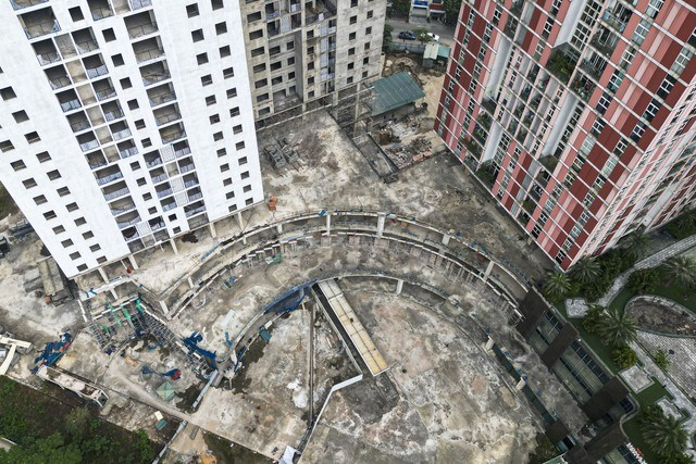 Những toà nhà “chết đứng” ở Hà Nội xây dựng xuyên thập kỷ vẫn chưa hoàn thiện - Ảnh 2.