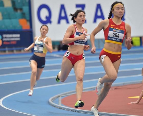 Cô gái vàng Nguyễn Thị Huyền giành ngôi á quân 400m ở châu Á - Ảnh 1.