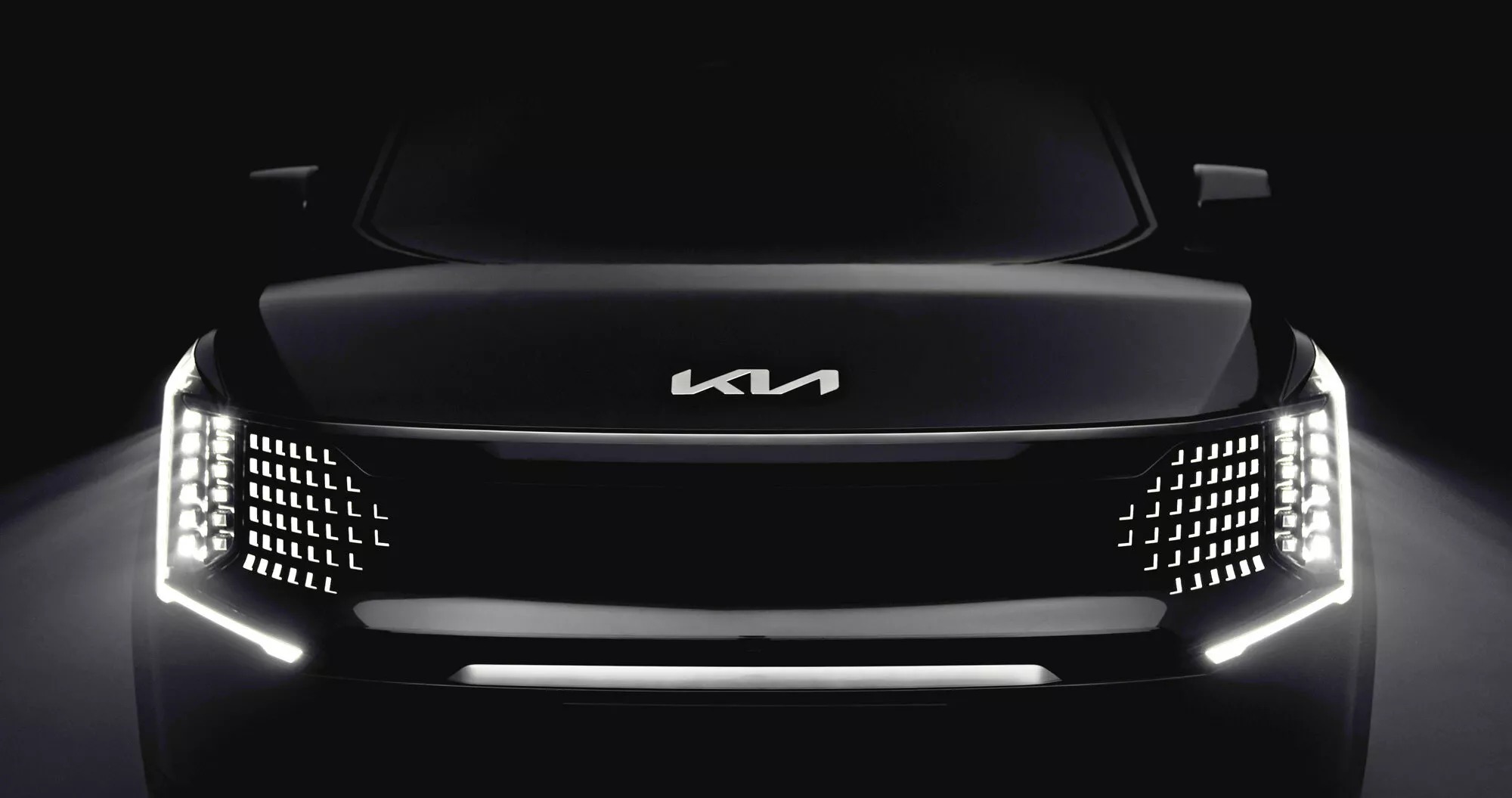 Kia EV9 nhá hàng trước giờ G: Dàn đèn trước nhấp nháy như biển quảng cáo, có chi tiết y chang Range Rover - Ảnh 1.