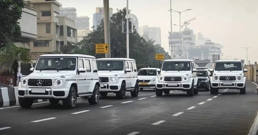 Đoàn xe 10 chiếc Mercedes-AMG G63 và Range Rover của đội vệ sĩ tháp tùng tỷ phú giàu nhất châu Á: Giá gần 4 triệu USD, thị uy trên đường phố - Ảnh 2.