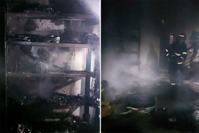 Cứu 6 người mắc kẹt ở tầng 4 căn nhà bị cháy ở Hà Nội - Ảnh 1.