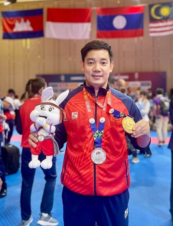 Giáo viên ở TPHCM giành huy chương vàng tại SEA Games 32 - Ảnh 1.