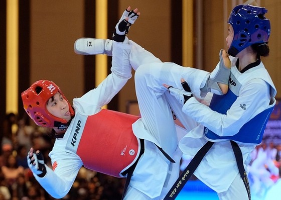 Ngay sau SEA Games 32, Trương Thị Kim Tuyền chinh phục giải taekwondo vô địch thế giới - Ảnh 1.