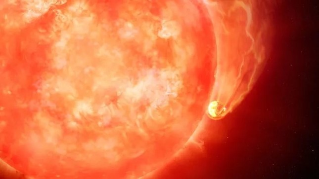 Lần đầu tiên chứng kiến ngôi sao sắp chết nuốt chửng một hành tinh và tương lai của Trái đất - Ảnh 1.