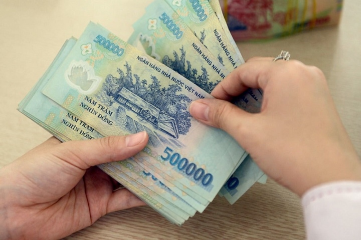 Lương tối thiểu vùng từ 1/7/2023 thực hiện thế nào? - Ảnh 1. Lương tối thiểu vùng từ 1/7/2023 thực hiện thế nào? - Ảnh 1.