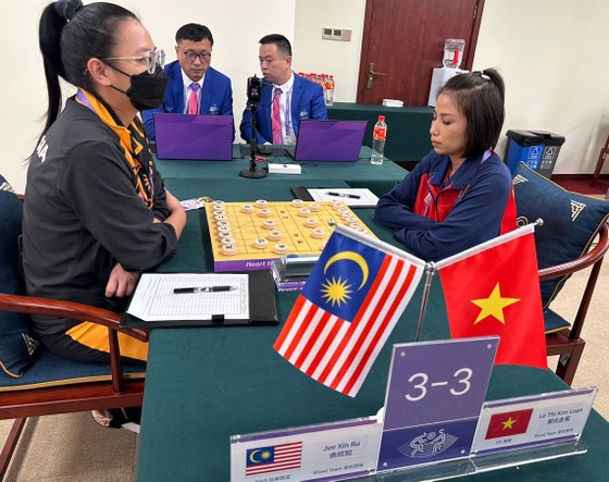 Thắng kịch tính Malaysia bằng ván cờ 4 giờ đồng hồ, cờ tướng Việt Nam lấy lại tinh thần - Ảnh 2.