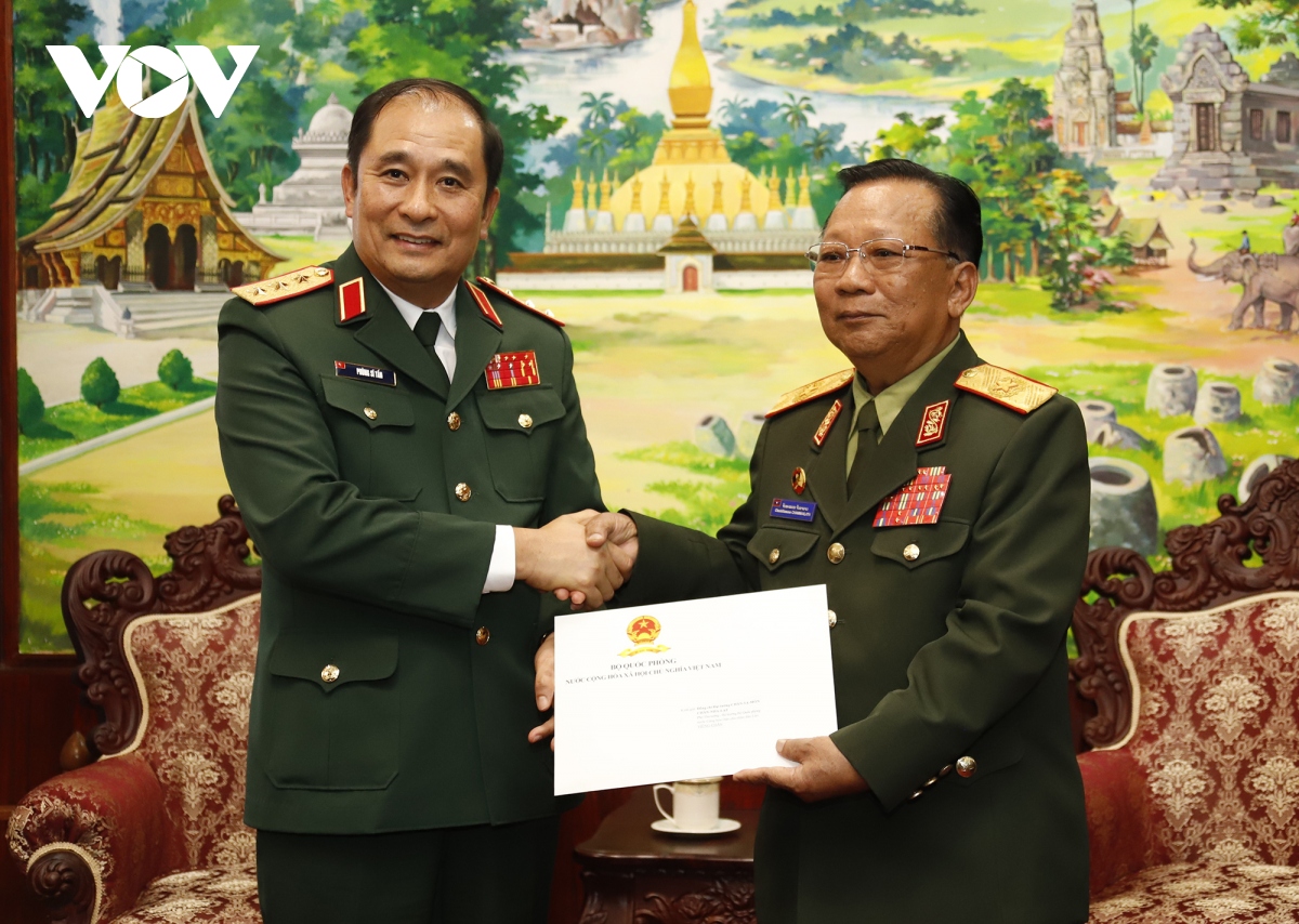 Bộ Quốc phòng Việt Nam chúc mừng 75 năm thành lập Quân đội nhân dân Lào- Ảnh 1.