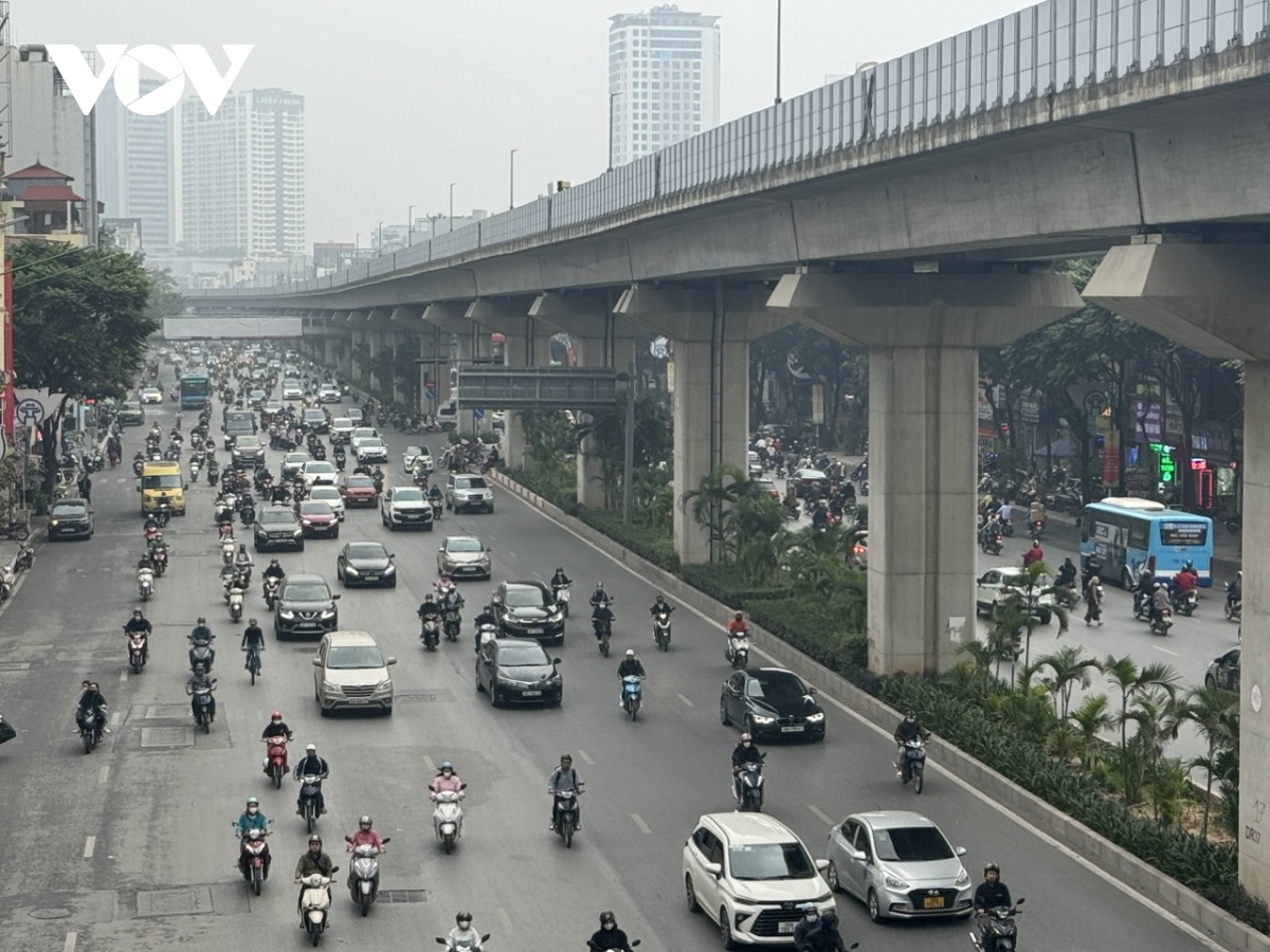 Ngày đầu tiên đi làm của năm mới, đường phố Hà Nội thông thoáng lạ thường- Ảnh 10.