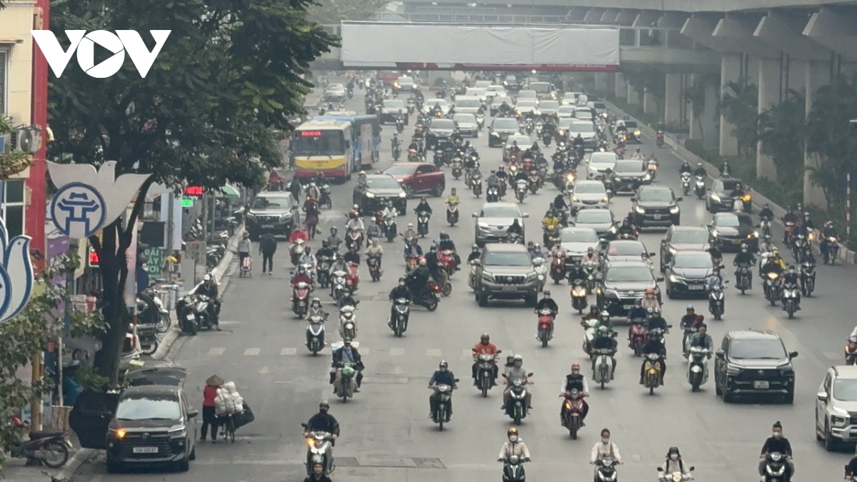 Ngày đầu tiên đi làm của năm mới, đường phố Hà Nội thông thoáng lạ thường- Ảnh 11.