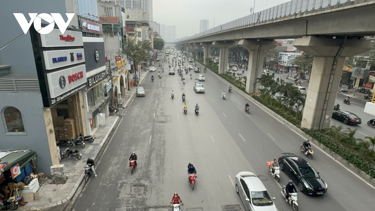 Ngày đầu tiên đi làm của năm mới, đường phố Hà Nội thông thoáng lạ thường- Ảnh 13.