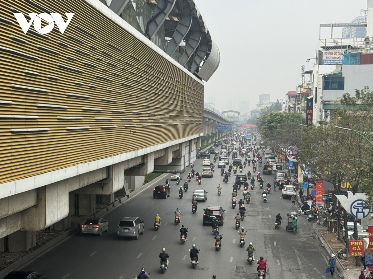 Ngày đầu tiên đi làm của năm mới, đường phố Hà Nội thông thoáng lạ thường- Ảnh 15.