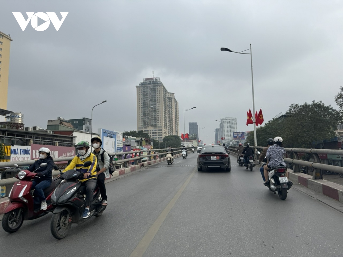 Ngày đầu tiên đi làm của năm mới, đường phố Hà Nội thông thoáng lạ thường- Ảnh 19.
