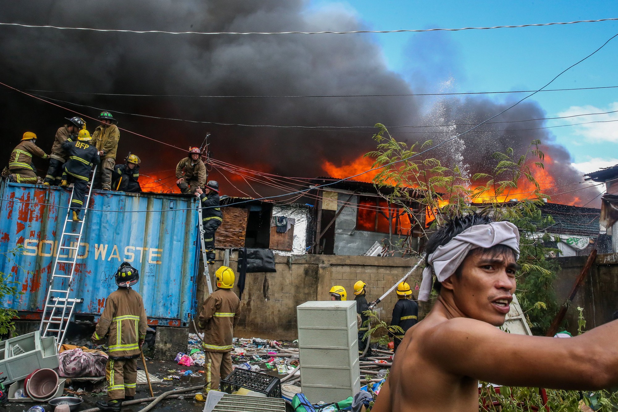 Kinh hoàng vụ cháy thiêu rụi 1000 ngôi nhà ở Manila - Ảnh 4.