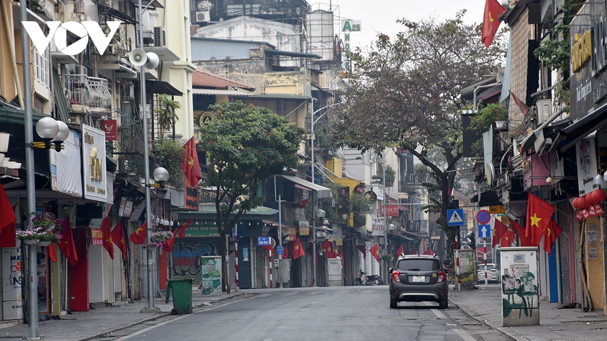 Phố phường Hà Nội tĩnh lặng, yên bình ngày đầu năm mới- Ảnh 11.