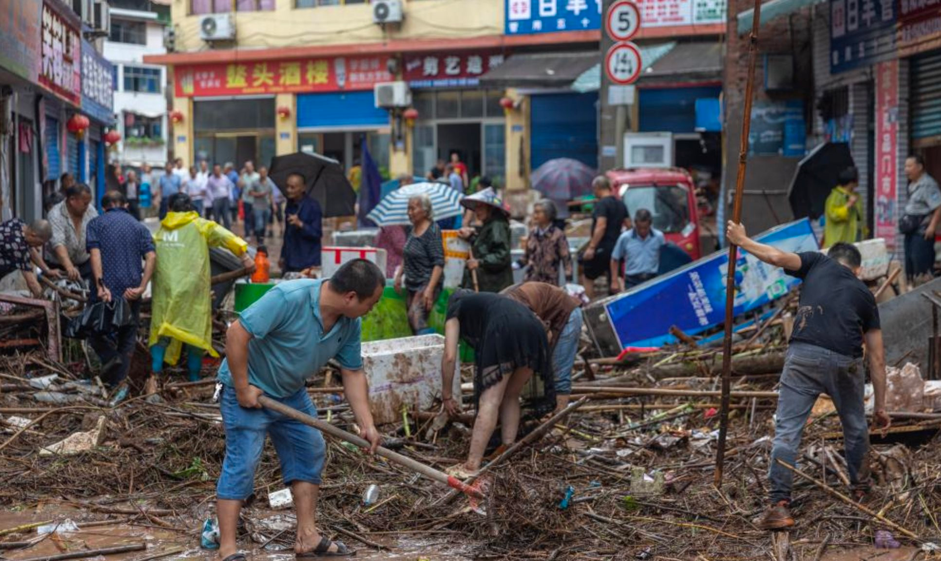 Siêu đô thị của Trung Quốc ngập trong mưa lớn: Thiệt hại gần 300 tỷ đồng, 'căng như dây đàn' khi Đập Tam Hiệp chuẩn bị xả lũ với lượng nước 43.000 m3/s- Ảnh 3.