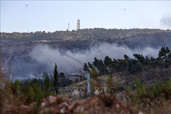 Hezbollah bắn 80 quả tên lửa vào miền Bắc Israel- Ảnh 1.