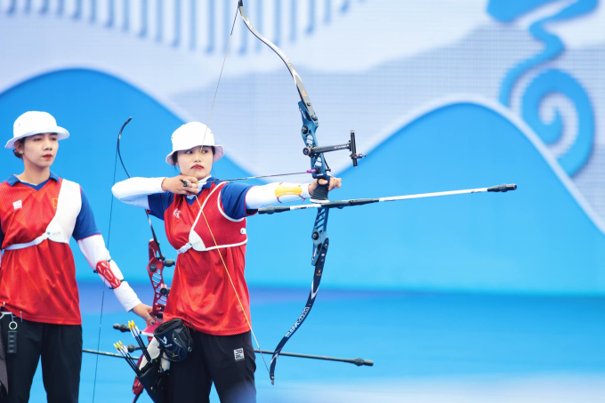 Cung thủ Đỗ Thị Ánh Nguyệt “mở hàng” cho Việt Nam ở Olympic: Giương cung bản lĩnh, ngoài đời xinh đẹp ngọt ngào- Ảnh 1.